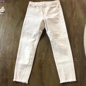 Levi’s button-front white denim jeans